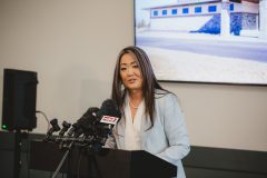 Woman speaks at a podium