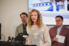 Woman speaking at podium