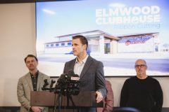 Man speaks at podium