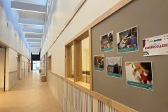 hallway with sign that says welcome to kindercollege