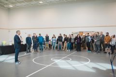 Man speaking to crowd