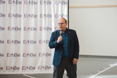 Man speaks into microphone