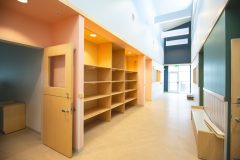 bright hallway with car seat storage