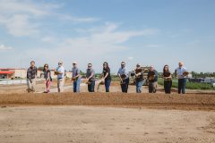 Troy and Kristin Fox joined by project officials and community leaders