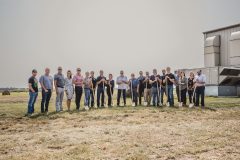Project officials, community leaders and Global Polymer staff