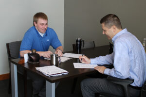 Riley Bullington, left, will primarily work with Heartland Director of Economic Development Ryan Brown during his internship.