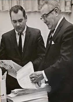 Walter Canney, left, and Virgil Hanlon review signed petitions in support of the formation of Heartland in 1968.
