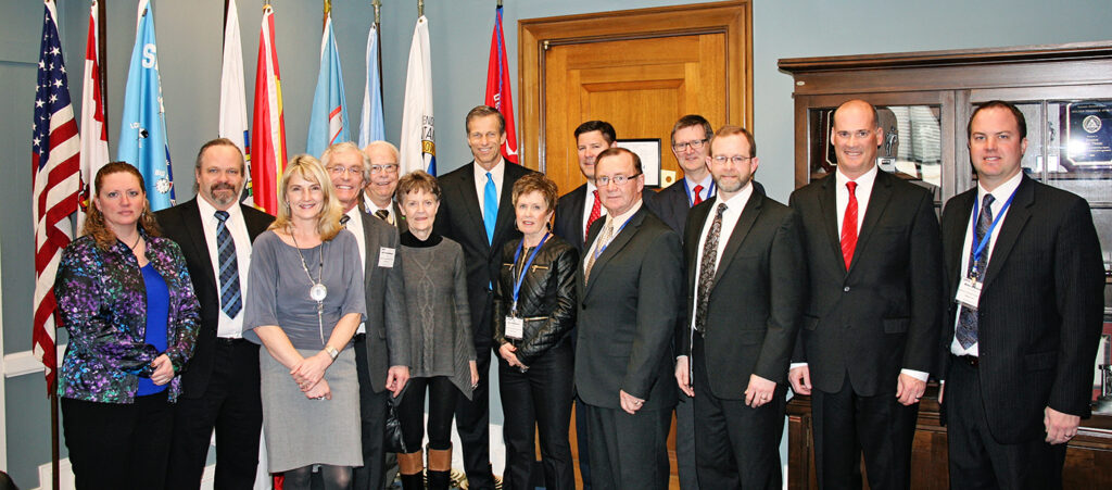After meeting with members of Heartland’s board and staff in March of 2014, U.S. Senator John Thune (R-SD) signed on as a co-sponsor of the Public Power Risk Management Act. Senator Thune is in the center in a blue tie.
