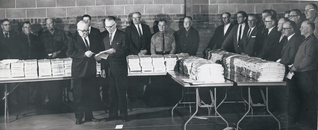East River Electric directors and board members prepare to distribute the Heartland petitions in 1968.