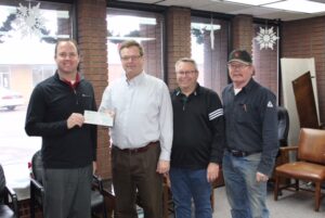 From left to right: Heartland CFO Mike Malone, Plankinton Development Board President Ron Kristensen, Heartland Customer Relations Manager Steve Moses, and Plankinton Light Superintendent Vern Hill