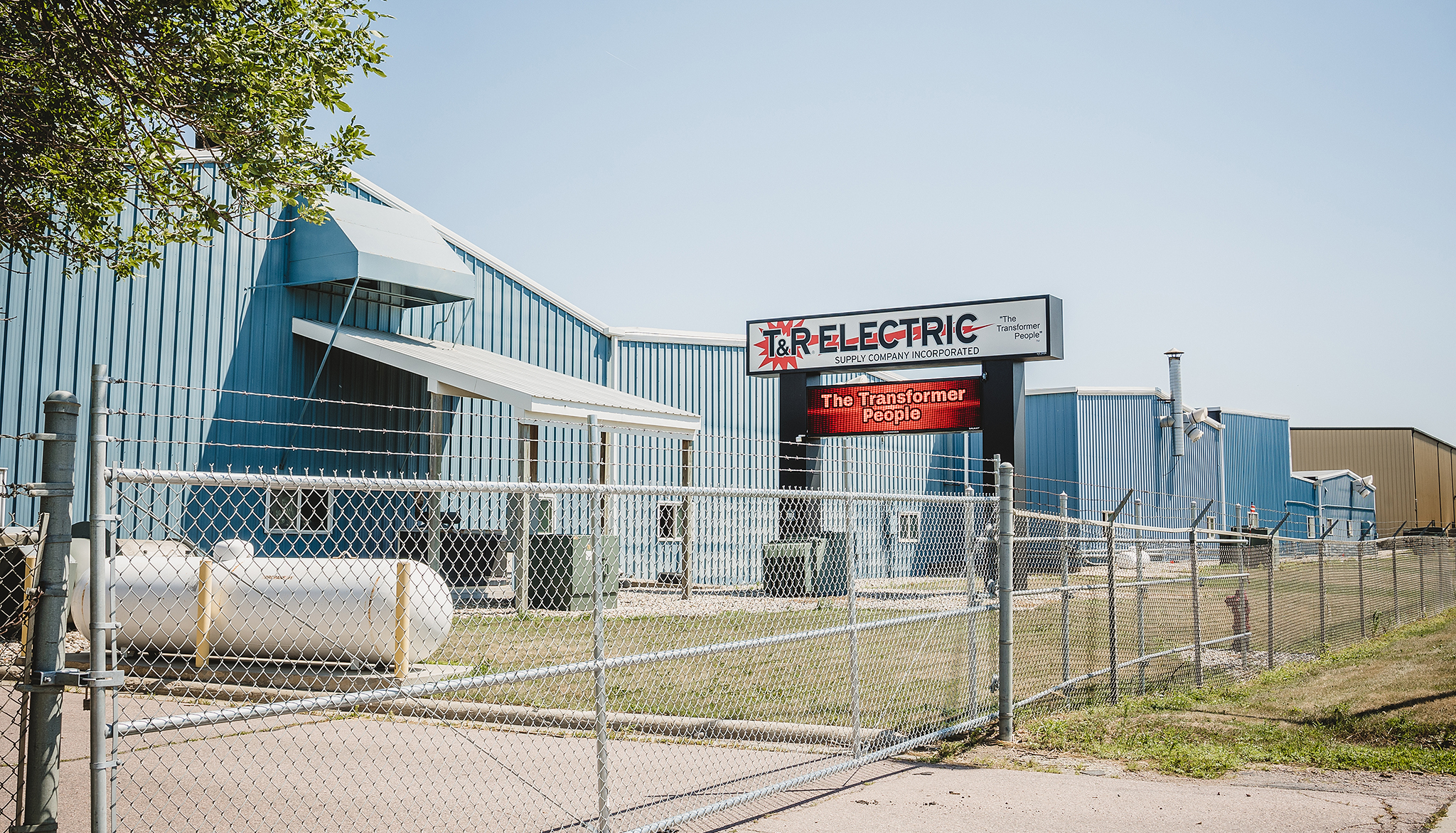 T&R Electric sign and building
